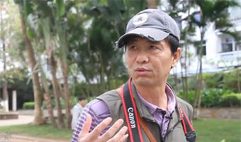 纪实摄影家黄一鸣以镜头记录海南30载成长