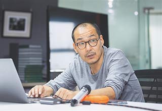 摄影人王军：用镜头为奋进海南“画像”